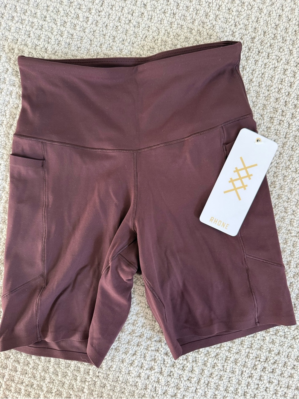 RHONE High-Rise Bike Shorts in burgundy